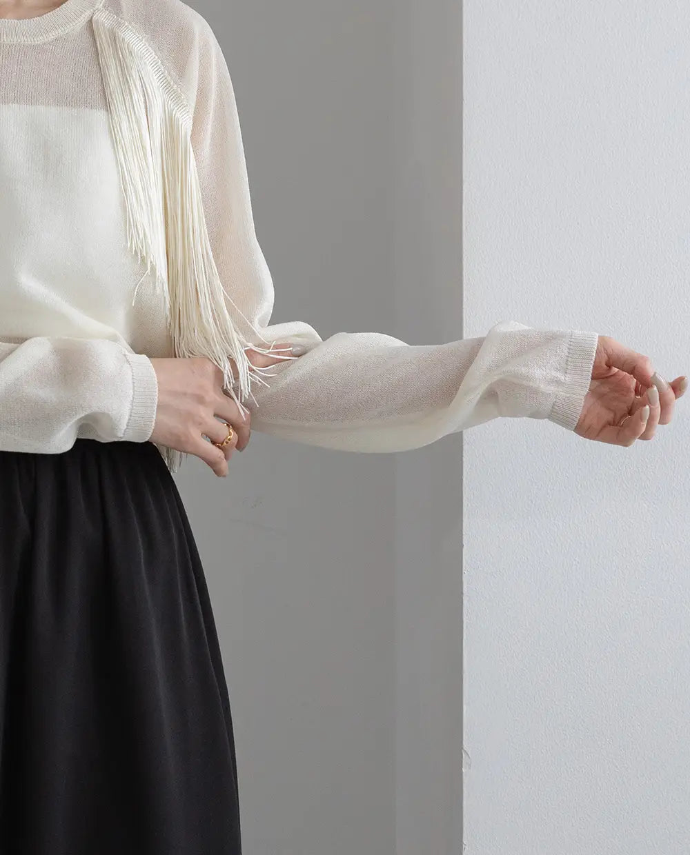 Asymmetric Fringe Sheer Knit